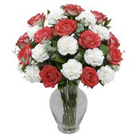 Deliver Red Rose White Carnation Vase 18 Rakhi Flowers in Delhi