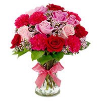 Deliver Red Carnation Pink Red Rose in Vase 12 Flowers to Delhi on Rakhi