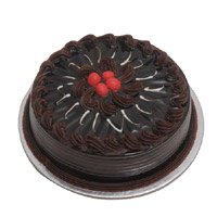 Send Rakhi with 1 Kg Eggless Chocolate Cake to Delhi