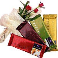 Deliver Karwa Chauth Gifts in Delhi. 4 Cadbury Temptation Chocolates With 3 Red Roses in Delhi