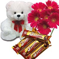 Send Cheap Online Gifts to Delhi of 6 Red Gerbera, 6 Inch Teddy Bear and 4 Five Star Chocolates on Rakhi