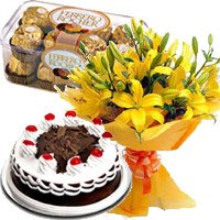 Send Rakhi Gifts to Delhi with 12 Yellow Lily with 1/2 Kg Black Forest Cake and 16 Pcs Ferrero Rocher