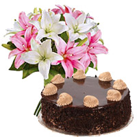 Get Rakhi Gifts to Delhi. 6 Pink White Lily 1 Kg Chocolate Cake in Delhi From 5 Star Hotel