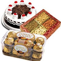 Send 1/2 Kg Black Forest Cake and 1/2 Kg Dry Fruits and 16 pcs Ferrero Rocher Chocolates Delhi
