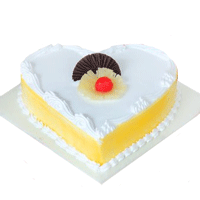 Send Rakhi and Cake to Delhi with 1 Kg best Eggless Heart Shape Pineapple Cake in Delhi