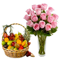 12 Pink Roses in Vase with 1 Kg Fresh Fruits Basket : Send Karwa Chauth Gift Hampers to Delhi