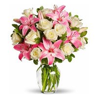 Place Order for Rakhi with Flowers. Pink Lily White Rose in Vase 15 Flowers to Delhi