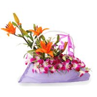 Send 9 Orchids 3 Lily Arrangement. Online Rakhi Flower Delivery in Delhi