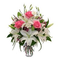 Send Pink Roses and White Lily in Vase. Online Rakhi Flowers to Delhi