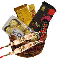 Online Rakhi Gift Delivery to Delhi consist of Ferrero Rocher, Bournville, Mars, Temptation, Toblerone Chocolate Basket