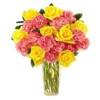 Send Rakhi with Flowers to Delhi. Online Pink Carnation Yellow Rose in Vase 24 Flowers to Delhi