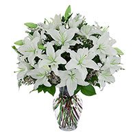 Send Rakhi to Delhi. White Lily in Vase 8 Flower Stems