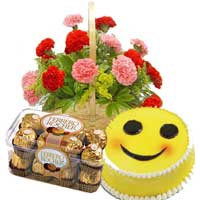 Online Rakhi Delivery of 15 Red Pink Carnation Basket with 16 pcs Ferrero Rocher and 1 Kg Smiley Cakes in Delhi